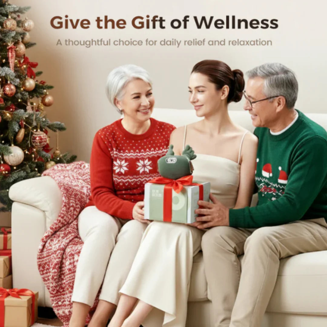 Three people sitting on a couch with a Christmas tree, holding a gift, and text about giving the gift of wellness.